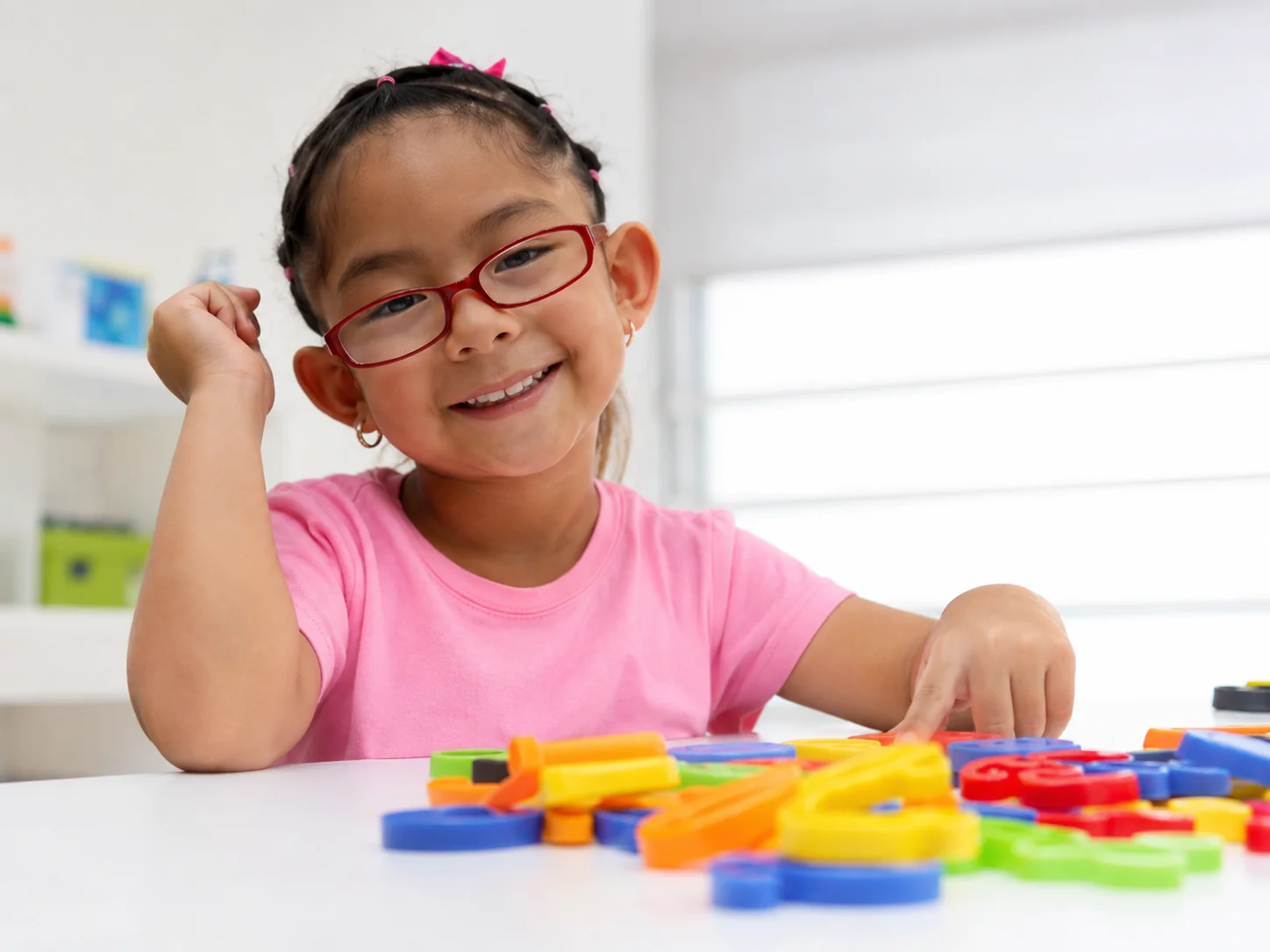 Support worker spending time with a child in a calm care setting